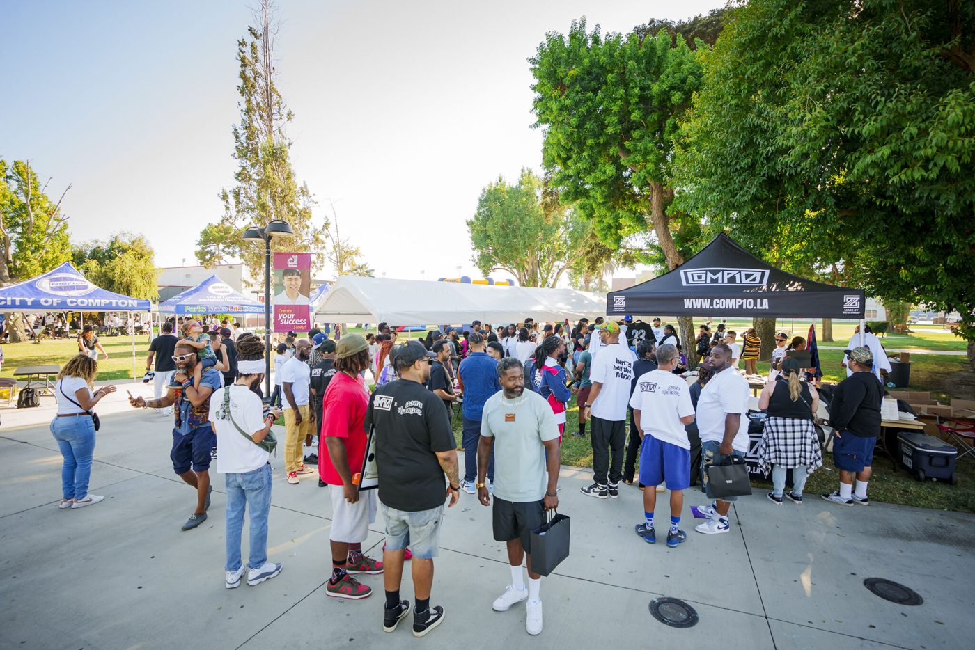 The Comp10 booth and crowd at Compton Fest